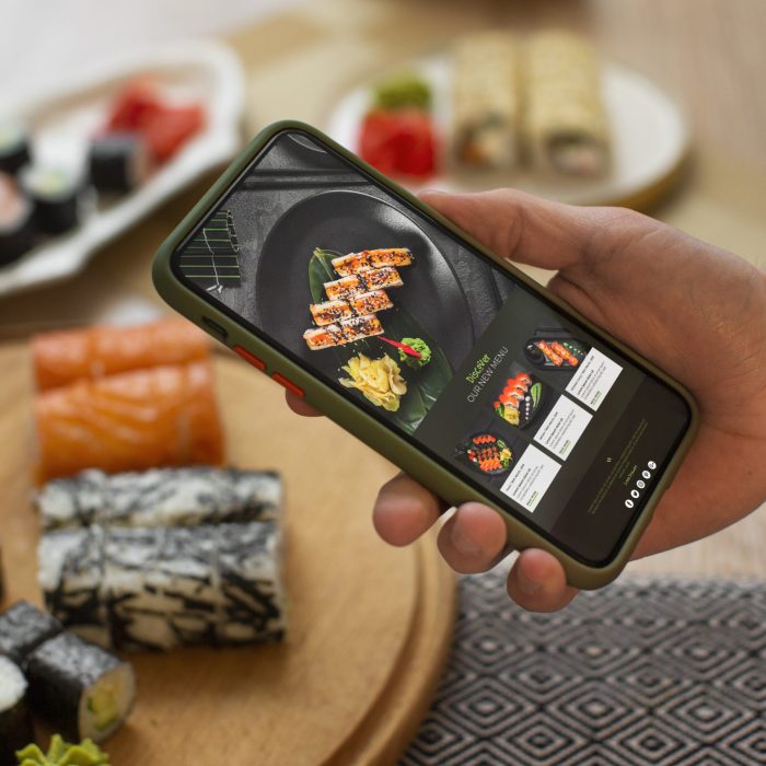 high-angle-hand-holding-smartphone